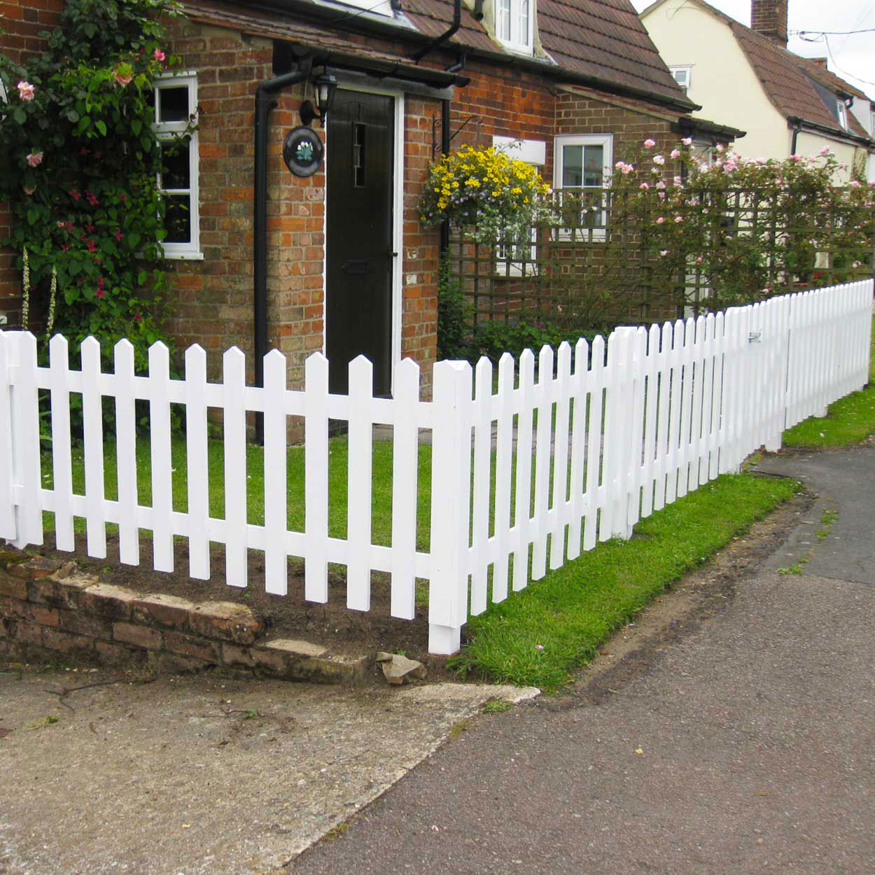 White Picket Fence And House