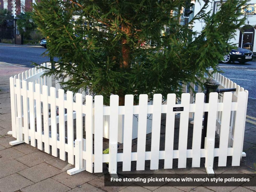 White free standing picket fencing with feet and ranch style pales