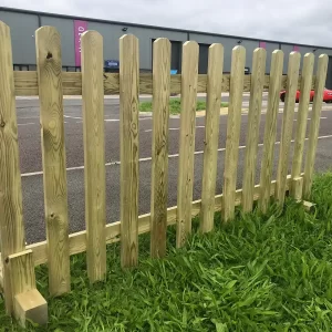 Picket fencing with feet tanalised redwood